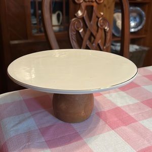 Ceramic pedestal with wooden base. Lots of uses!
